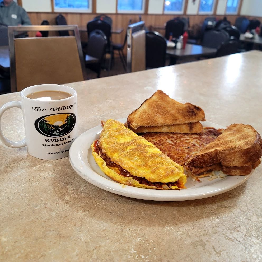 Omelette and hash browns at The Villager Restaurant